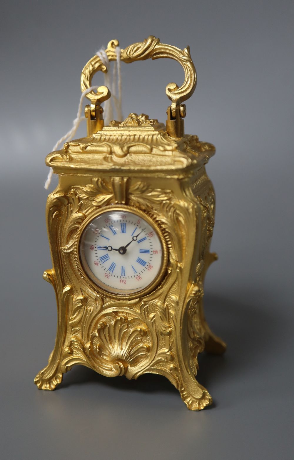A miniature carriage timepiece